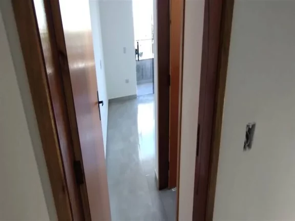 Imagem Sobrado com 2 dormitórios à venda, 77 m² por R$ 350.000,00 - Caiçara - Praia Grande/SP