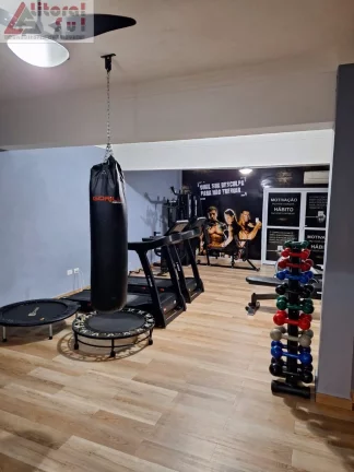 Imagem Apartamento para locação em Praia Grande-SP, Tupi: 2 quartos, 1 suite, 1 sala, 2 banheiros, 1 vaga de garagem.