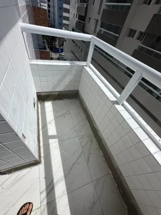 Imagem Apartamento à venda na Guilhermina, Praia Grande-SP: 1 quarto, 1 suíte, 1 sala, 2 banheiros, 51m² de área.