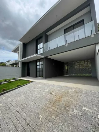 Imagem Casa com 3 dormitórios sendo 3 suítes e 2 vagas de garagem em Joinville/SC