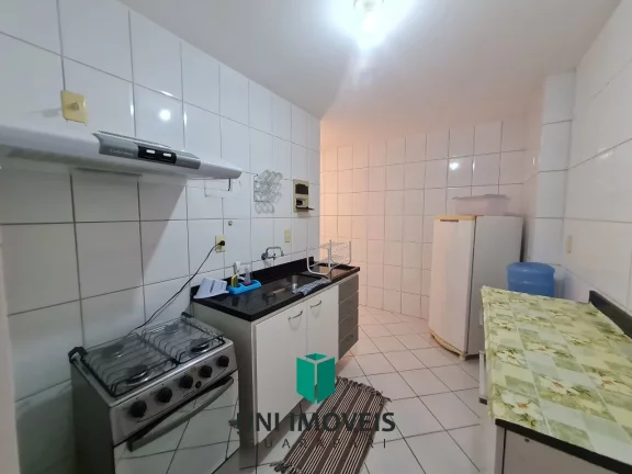 Imagem Apartamento à venda na Praia do Morro em Guarapari - Varanda, Elevador e Vista lateral para o mar