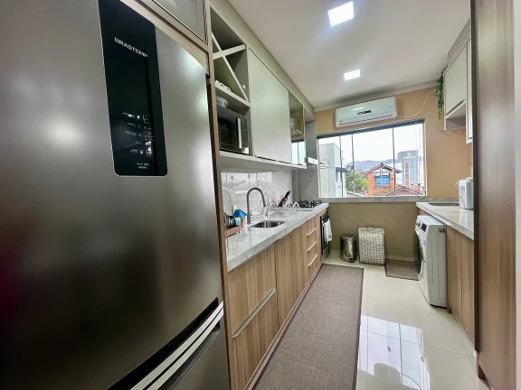 Imagem Apartamento com 2 dormitórios sendo 1 suíte e 1 vaga em Gravatá Navegantes/SC