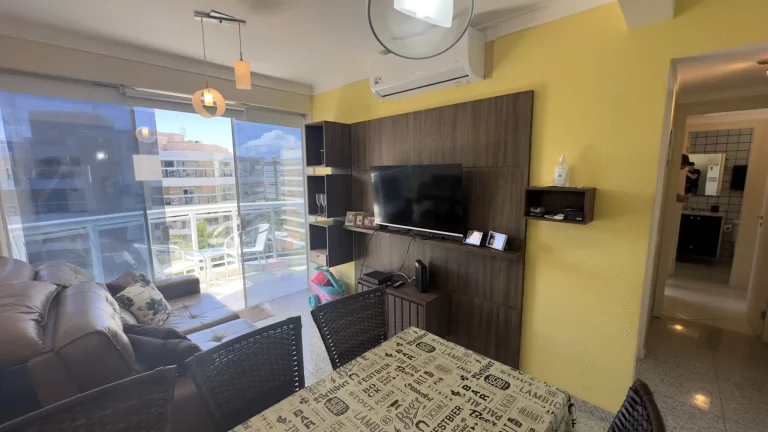 Imagem Apartamento pé na areia à venda em Riviera de São Lourenço Módulo 07: 2 vagas, 2 dormitórios, 1 suíte, 68m² - Varanda gourmet