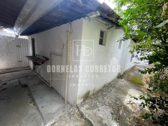 Imagem Oportunidade! Terreno + 3 Casas Prontas para Morar ou Alugar