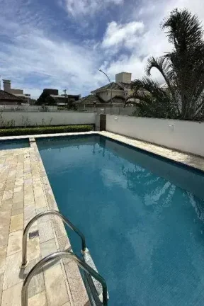 Imagem Casa de Alto Padrão em Jurerê Internacional a Poucos Minutos da Praia