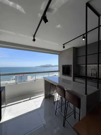 Imagem Apartamento vista mar com 2 suítes e 3 vagas de garagem em Balneário Perequê