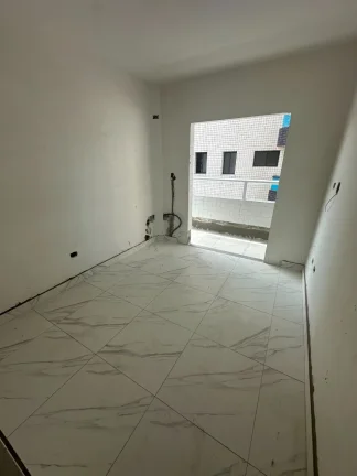 Imagem Apartamento à venda na Guilhermina, Praia Grande-SP: 1 quarto, 1 suíte, 1 sala, 2 banheiros, 51m² de área.