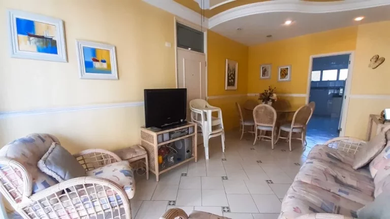 Imagem Astúrias, frente mar, vista lateral, 3 dormitórios e 1 vaga.