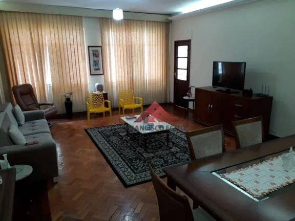 Imagem Excelente apartamento na praia de icaraí com pequena varanda lateral com vista parcial do mar,ampla sala de estar com 03 ambientes,sala de jantar,03