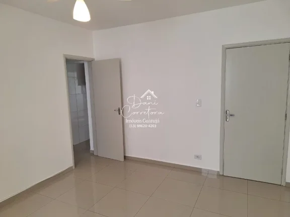 Imagem Imperdível oportunidade, apartamento de 2 quartos sem mobília na rua mais desejada do Guarujá-SP - 65m² - 1 vaga de garagem