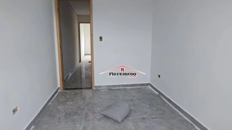 Imagem Casa com 2 dormitórios à venda, 60 m² por R$ 350.000 - Tude Bastos - Praia Grande/SP