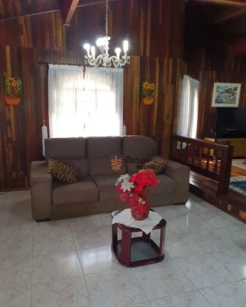 Imagem Casa com 3 dormitórios à venda, 235 m² por R$ 1.250.000,00 - Alto Do Capivari - Campos do Jordão/SP