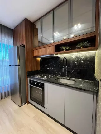 Imagem Apartamento quadra mar mobiliado com 2 suítes e 1 vaga de garagem - Gravatá em Navegantes/SC