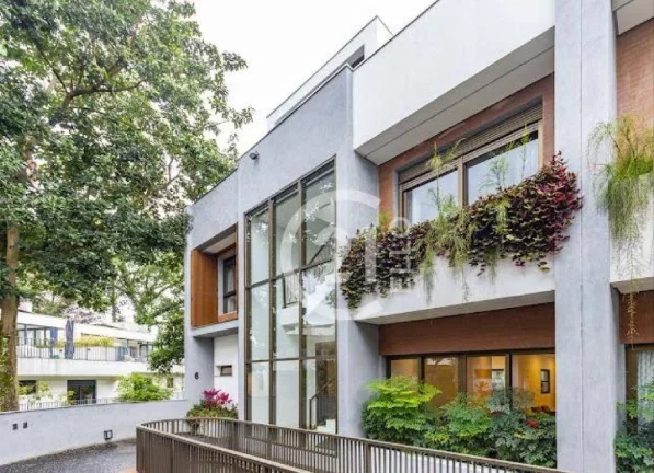 Imagem Casa em condomínio, 4 suítes, 690 m²