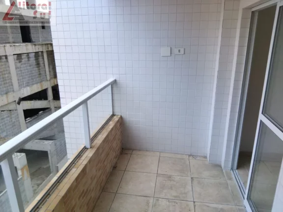 Imagem Apartamento à venda na Guilhermina, Praia Grande-SP: 2 quartos, 1 suíte, 1 vaga de garagem e 56m² de área. Adquira já!