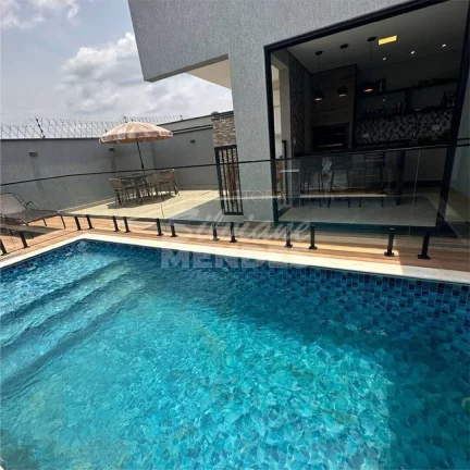 Imagem Casa com piscina aquecida no condomínio Santinon