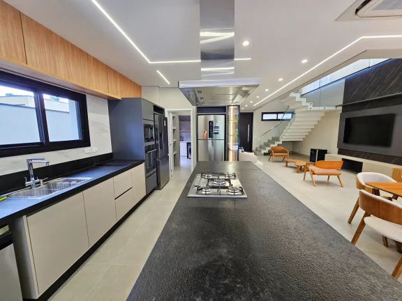 Imagem Casa de Luxo à Venda na Riviera de São Lourenço - Módulo 16: 5 Suítes, 3 Salas, 4 Vagas de Garagem e Piscina!