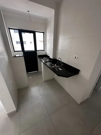 Imagem Imperdível oportunidade: Apartamento à venda em Praia Grande-SP, bairro Tupi, 2 quartos, 1 suíte, 2 salas, 1 vaga, 59m²!