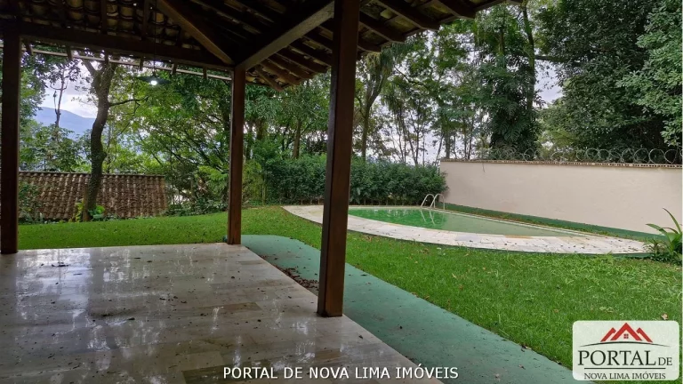 Imagem Casa a venda no condomínio Ipê da Serra, casa com armário e área de lazer com piscina. Venha conhecer no Portal de Nova Lima Imóveis - 31.98511-8000