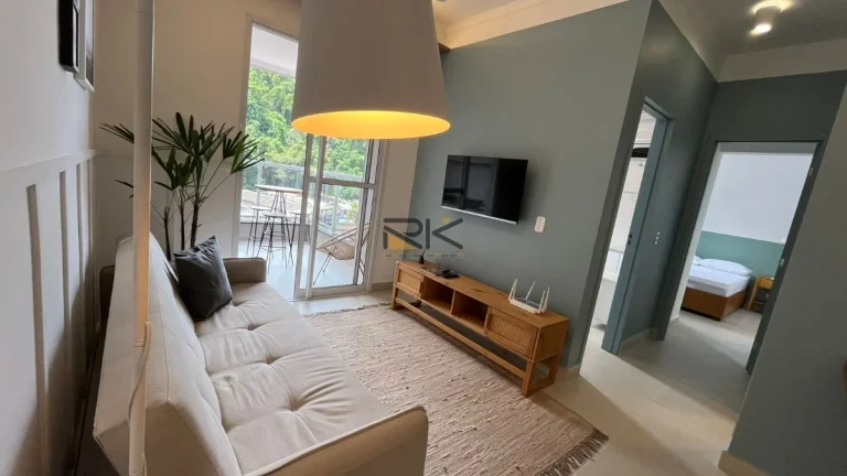 Imagem APARTAMENTO A VENDA NO PEREQUE AÇU COM SALA 2 AMBIENTES,VARANDA GOURMET COM CHURRASQUEIRA E 2 DORMITÓRIOS