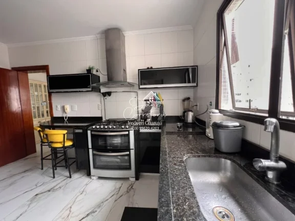 Imagem Apartamento com vista para o Tombo e vista para Astúrias com 3 suítes e 2 vagas no Tombo, Guarujá-SP: 214m² de puro requinte!