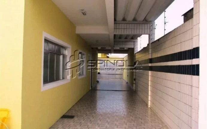 Imagem Casa com 3 dormitórios à venda, 190 m² por R$ 850.000 - Vila Tupi - Praia Grande/SP