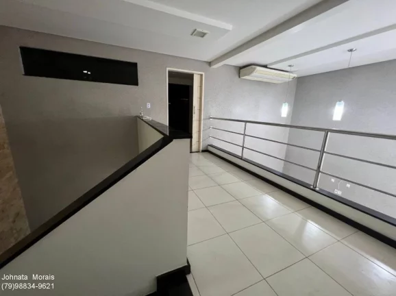 Imagem Casa à venda no Bairro Coroa do Meio com 6 quartos, área gourmet e jardim.