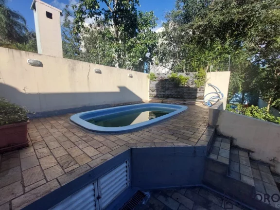 Imagem CASA 3 DORMITÓRIOS (1 SUITE) 4 VAGAS NA TRAV. DOMINGOS TREVISAN-CENTRO