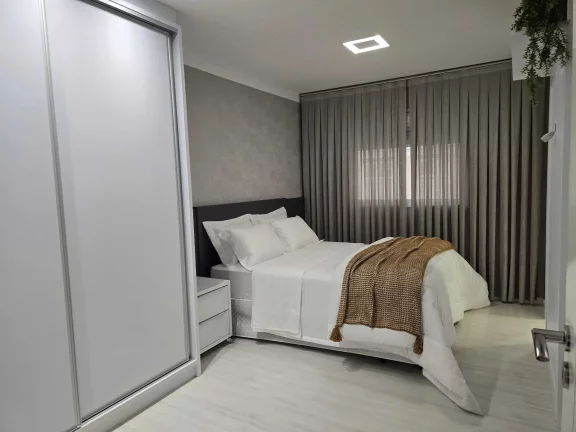 Imagem Apartamento com 3 dormitórios sendo 3 suítes e 2 vagas de garagem em Itapema/SC