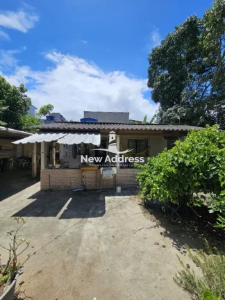 Imagem Casa 2 quartos à venda em Enseada de Jacaraípe, murada e gradeada, ideal para quem busca praticidade e quintal.