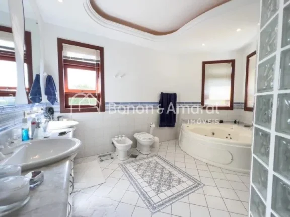 Imagem Essa linda casa esta disposta em três pavimentos sendo a área de lazer, gourmet, home theater, pis...