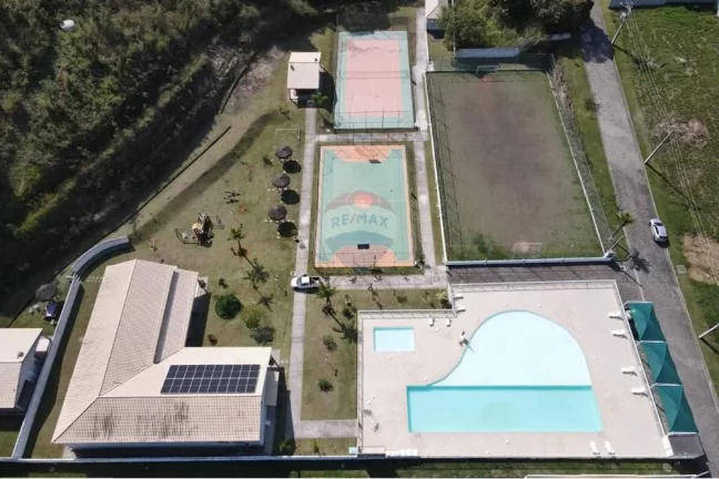 Imagem Terreno plano dentro de condomínio fechado.