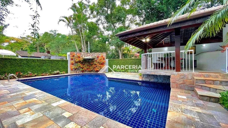 Casa com 4 suítes à venda, 480 m² por R$ 7.200.000 - Riviera Módulo 22 - Bertioga/SP