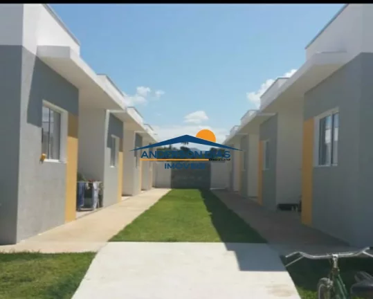 Casa com 2 dormitórios à venda, 56 m² por R$ 225.000 - Balneário dos Golfinhos - Caraguatatuba/SP