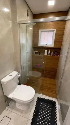 Imagem Lindo sobrado triplex com 2 suites, 4 banheiros, espaço goumert com churrasqueira, garagem box , piscina e salão de festas.
