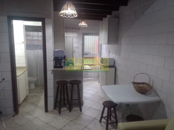 Imagem Flat de Condomínio à Venda em Ubatuba-SP: 1 Quarto, 1 Sala, 1 Banheiro e Mais!