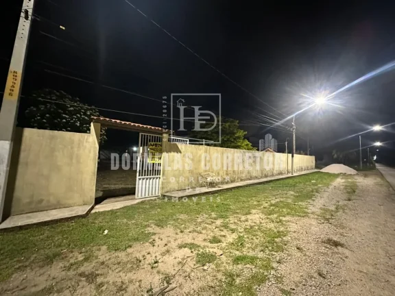 Imagem CASA A KM DO MAR COM ÁREA GOURMET E PISCINA, 3 QUARTOS, 1ST, VÁRIAS VAGAS DE GARAGEM, EM FRENTE A AVENIDA, TERRENO 30X30
