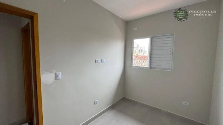 Imagem Sobrado com 2 dormitórios à venda, 49 m² por R$ 350.000 - Maracanã - Praia Grande/SP