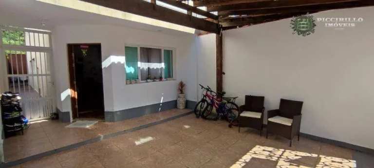 Imagem Sobrado com 3 dormitórios à venda, 118 m² por R$ 680.000,00 - Canto do Forte - Praia Grande/SP