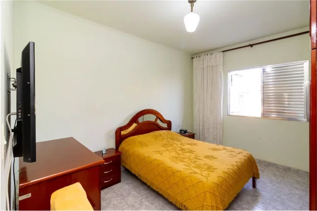 Imagem Sobrado com 5 casas e 1 galpão - Oportunidade de investimento ou moradia