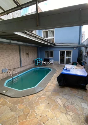 Imagem Casa 5 dormitórios com 2 suítes, com piscina, churrasqueira no bairro Partenon/Jardim Botânico