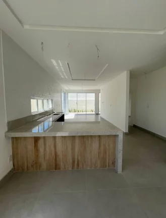 Imagem Terras Alphaville 1 - Casa de 3 suítes com 311m² e 3 vagas de garagem!