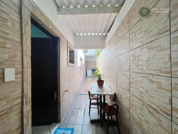 Imagem Casa com 2 dormitórios à venda, 85 m² por R$ 650.000,00 - Boqueirão - Praia Grande/SP