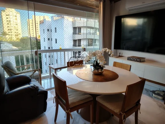 Imagem Imperdível! Apartamento de 2 quartos com suíte e 2 vagas de garagem em Pitangueiras, Guarujá-SP - 78m² de conforto e elegância!