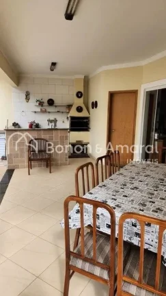 Imagem Lindo sobrado com 3 suites, sendo uma Master, escritório, piscina aquecida, área Gourmet, living c...
