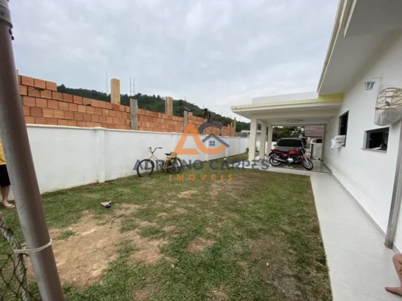 Imagem Imperdível oportunidade de adquirir uma casa em Penha - SC, com 2 quartos, 1 suíte e 127m² de área construída com uma edícula nos fundos a venda pela Adriano Carpes Imóveis