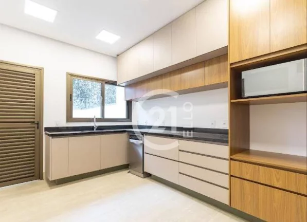 Imagem Casa em condomínio, 4 suítes, 690 m²