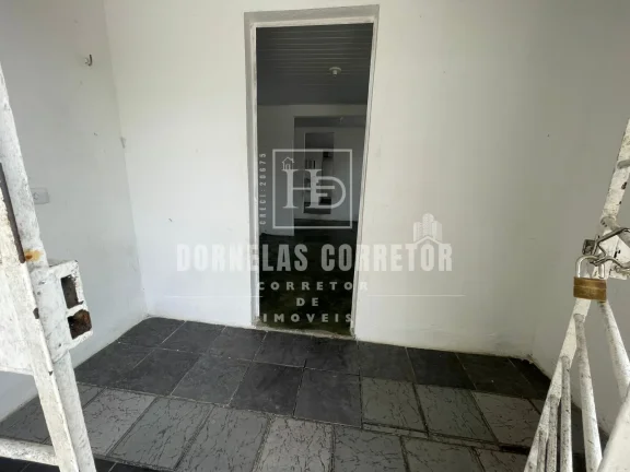 Imagem Oportunidade! Terreno + 3 Casas Prontas para Morar ou Alugar