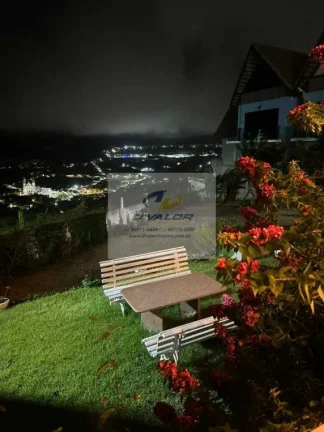 Imagem Vendo lindo Chalé com área total de 518 m², espaço gourmet e 3 vagas