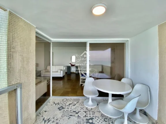 Imagem Apartamento com vista para o oceano no Morro do Maluf em Guarujá-SP: 3 quartos, 1 suíte, 2 salas, 3 banheiros, 1 vaga, 128m².